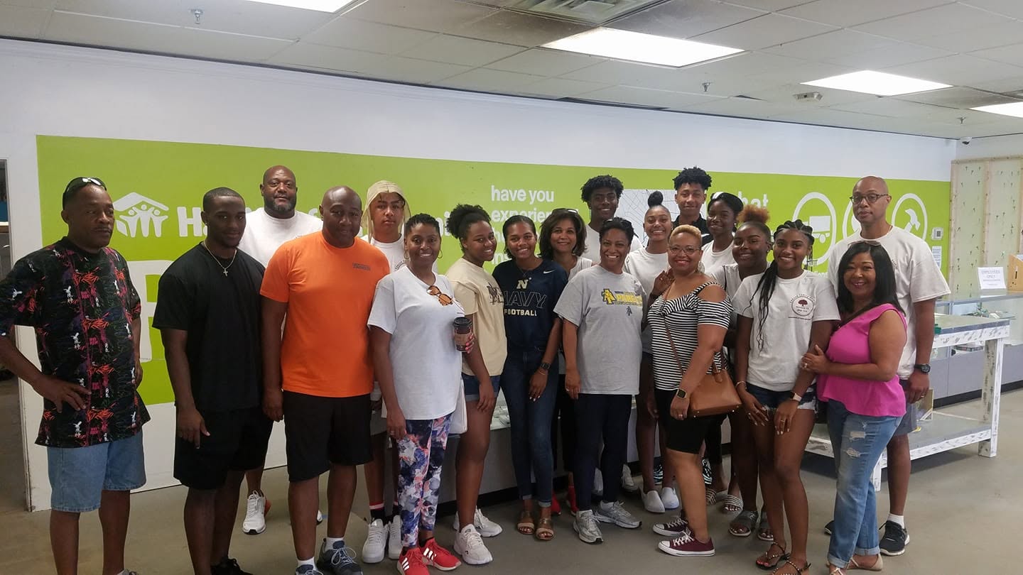 Edmond family members gathered together while volunteering at the Habitat for Humanity ReStore in Richmond, Virginia during the 2019 Family Reunion